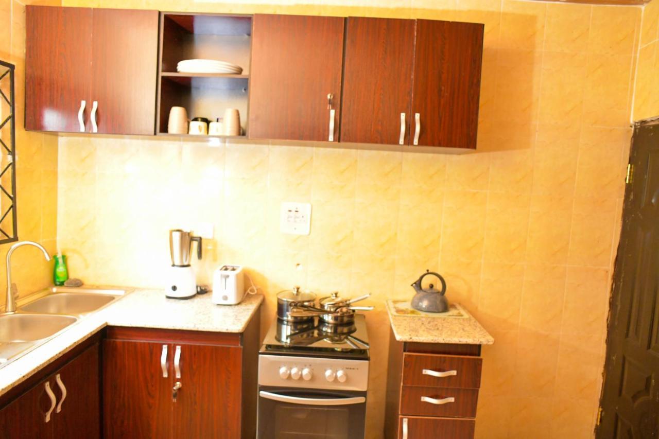 Living Green Apartments Airport Pick Up مدينة بنين المظهر الخارجي الصورة