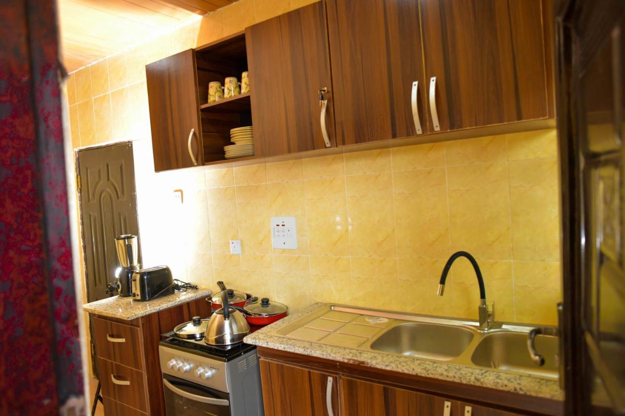 Living Green Apartments Airport Pick Up مدينة بنين المظهر الخارجي الصورة