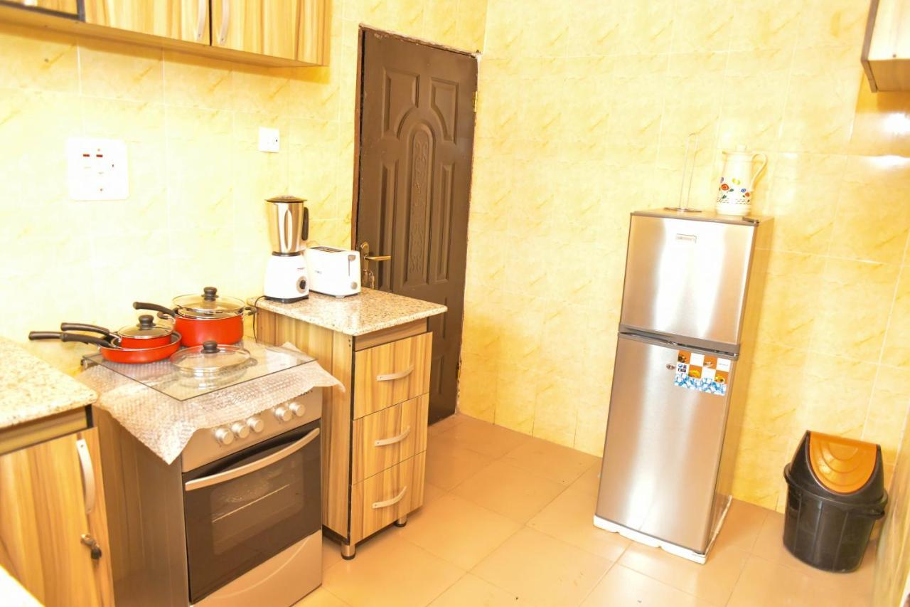 Living Green Apartments Airport Pick Up مدينة بنين المظهر الخارجي الصورة