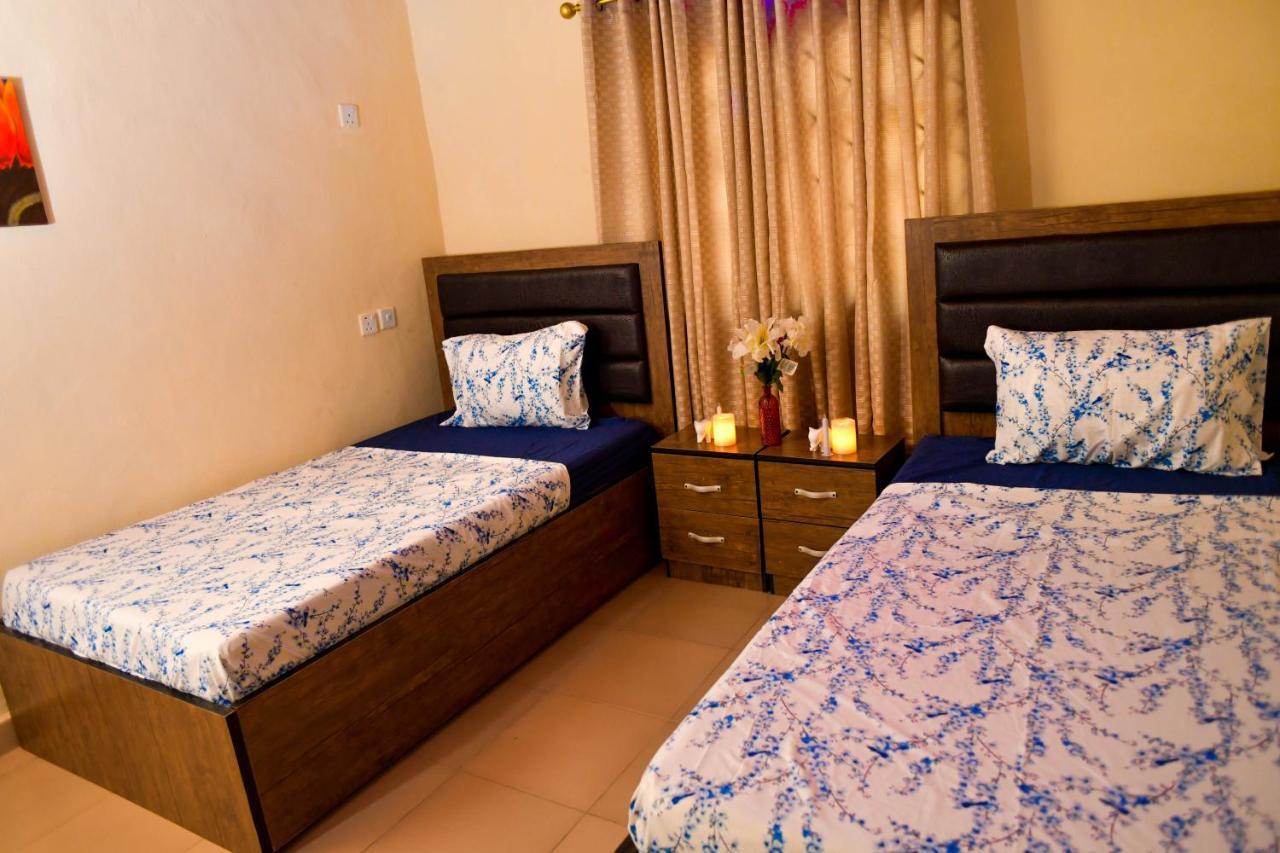 Living Green Apartments Airport Pick Up مدينة بنين المظهر الخارجي الصورة