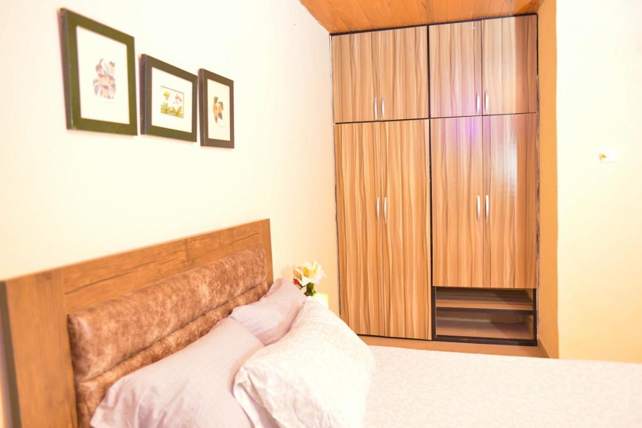 Living Green Apartments Airport Pick Up مدينة بنين المظهر الخارجي الصورة