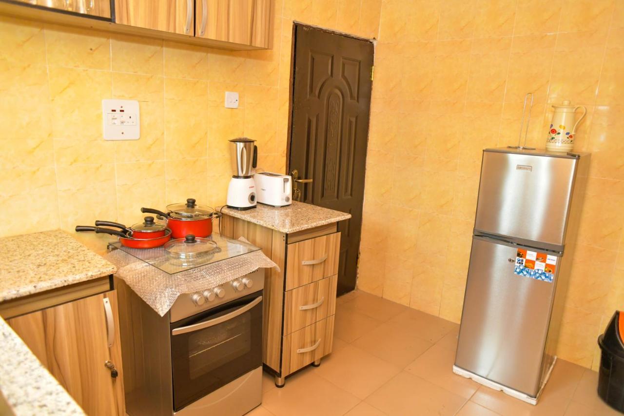 Living Green Apartments Airport Pick Up مدينة بنين المظهر الخارجي الصورة