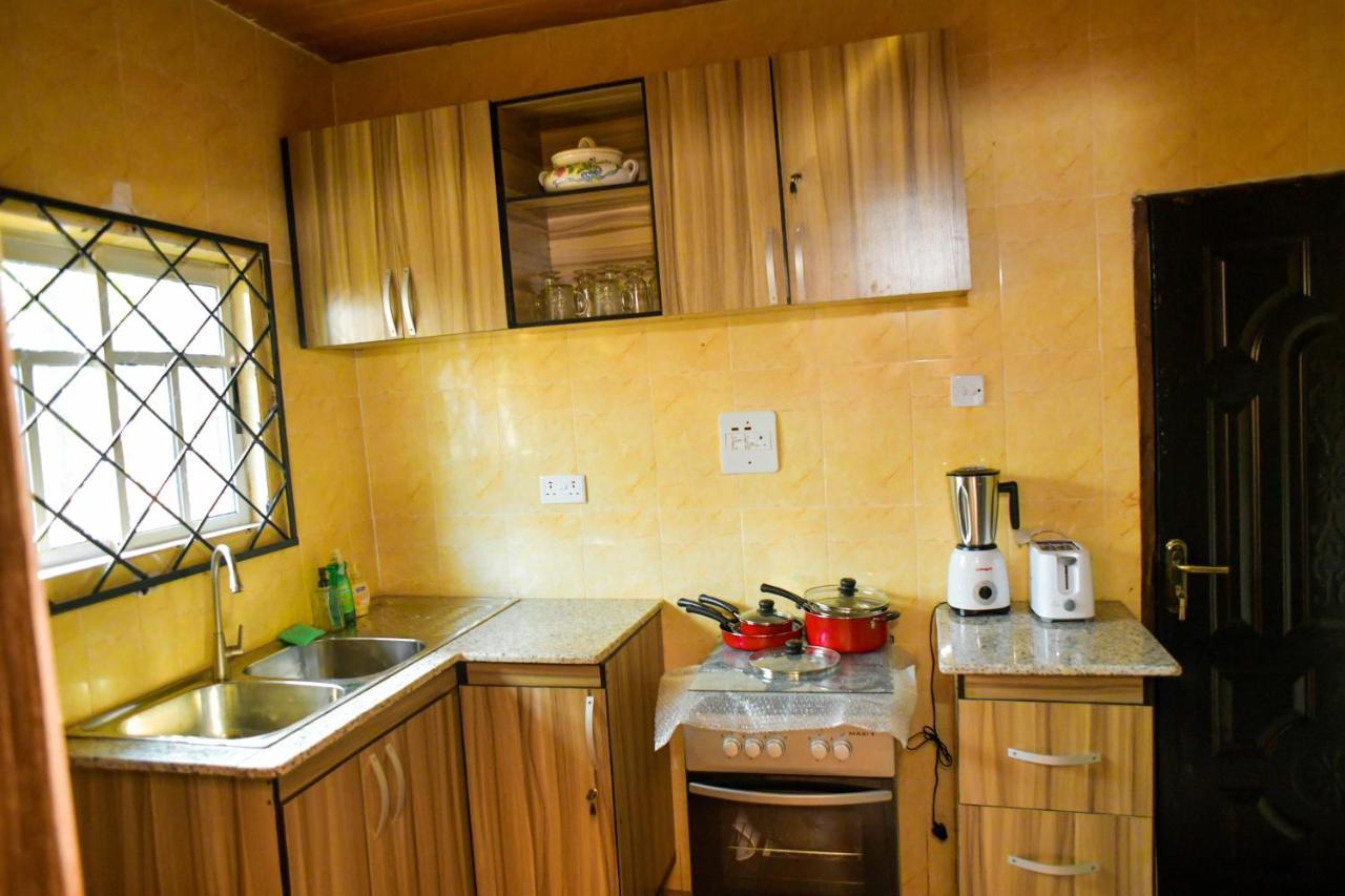 Living Green Apartments Airport Pick Up مدينة بنين المظهر الخارجي الصورة
