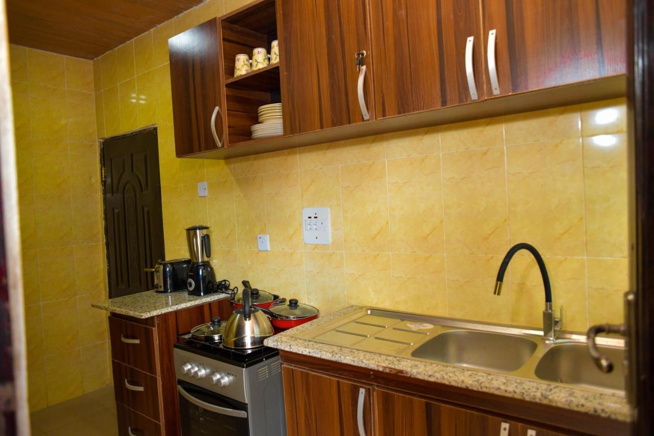 Living Green Apartments Airport Pick Up مدينة بنين المظهر الخارجي الصورة