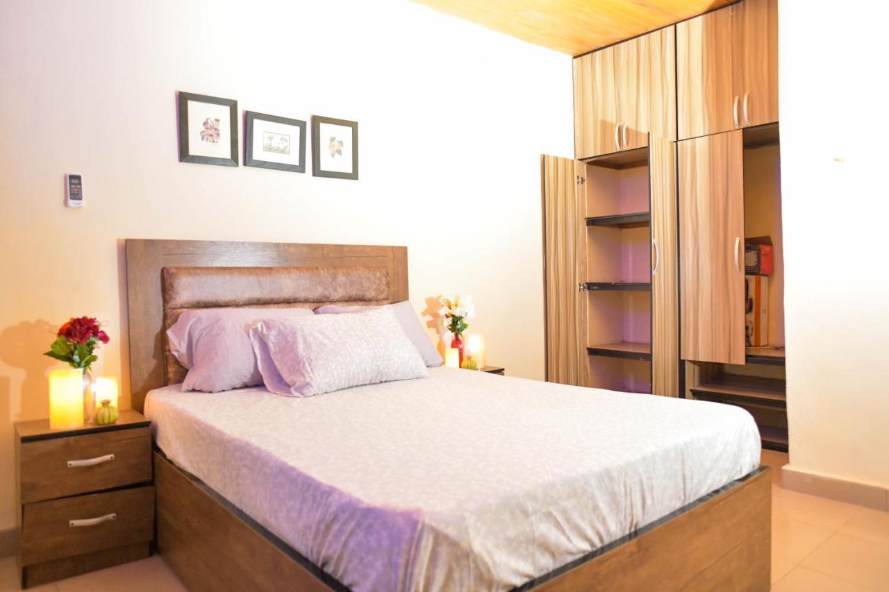 Living Green Apartments Airport Pick Up مدينة بنين المظهر الخارجي الصورة