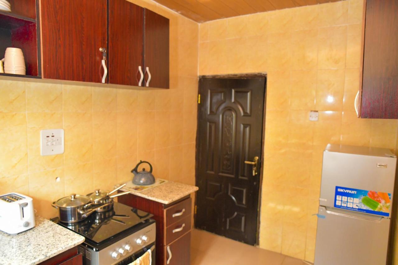 Living Green Apartments Airport Pick Up مدينة بنين المظهر الخارجي الصورة