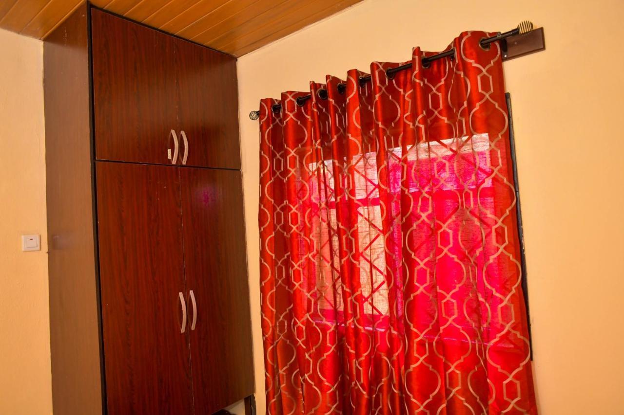 Living Green Apartments Airport Pick Up مدينة بنين المظهر الخارجي الصورة