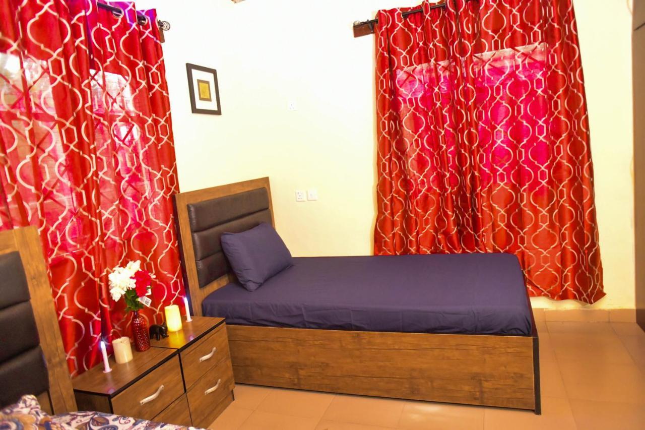 Living Green Apartments Airport Pick Up مدينة بنين المظهر الخارجي الصورة